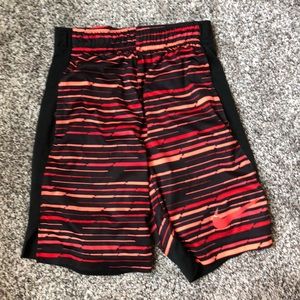 Nike kids large size shorts, black and orange